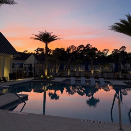 pool with beautiful sunset skies
